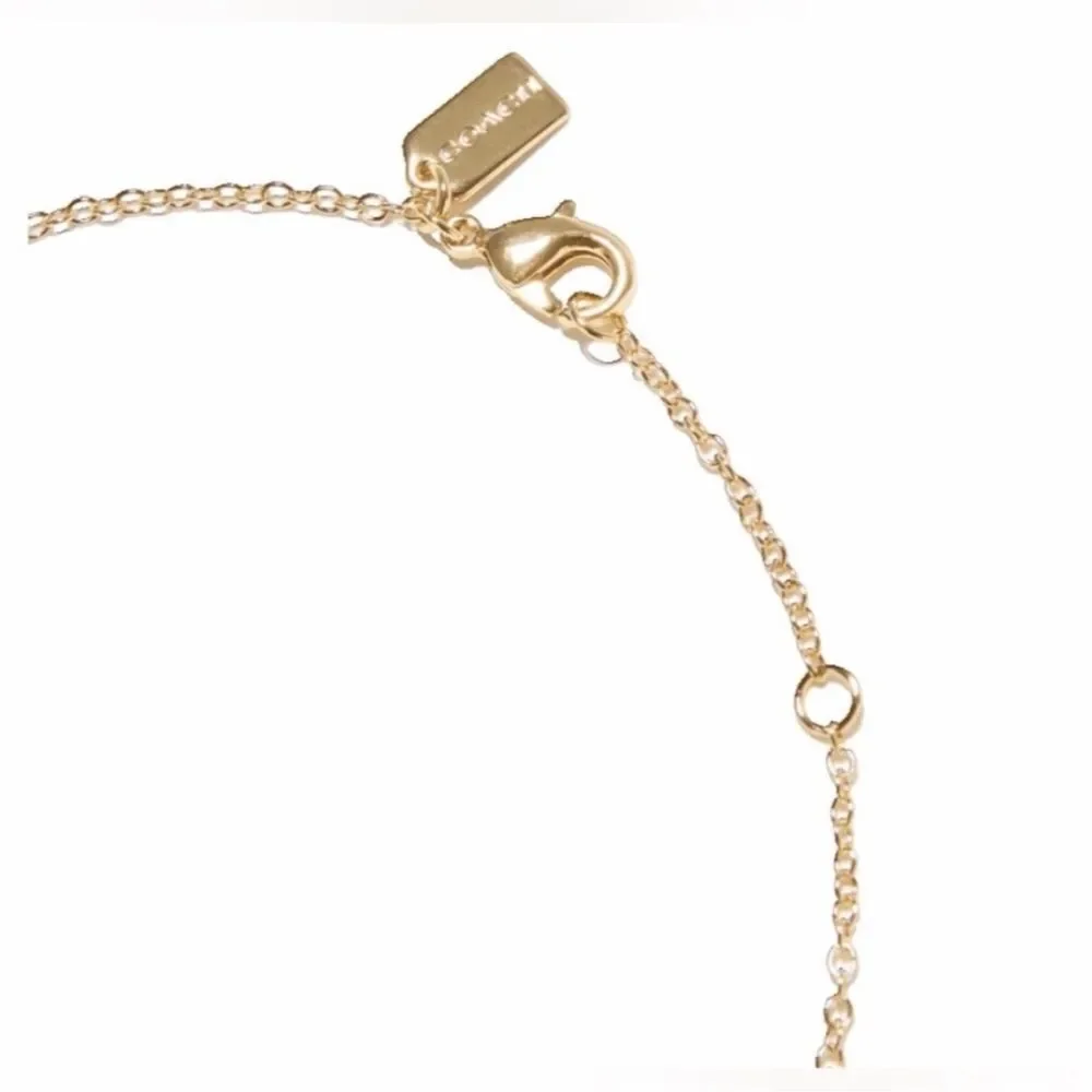 Coach Necklace with Heart-Shaped Pendant - Gold